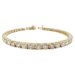 Bracciale tennis con diamanti naturali da 6,90 carati in oro giallo 14 carati