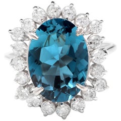 6.90 Carat Natural Impressive London Blue Topaz and Diamond 14 Karat Gold Ring