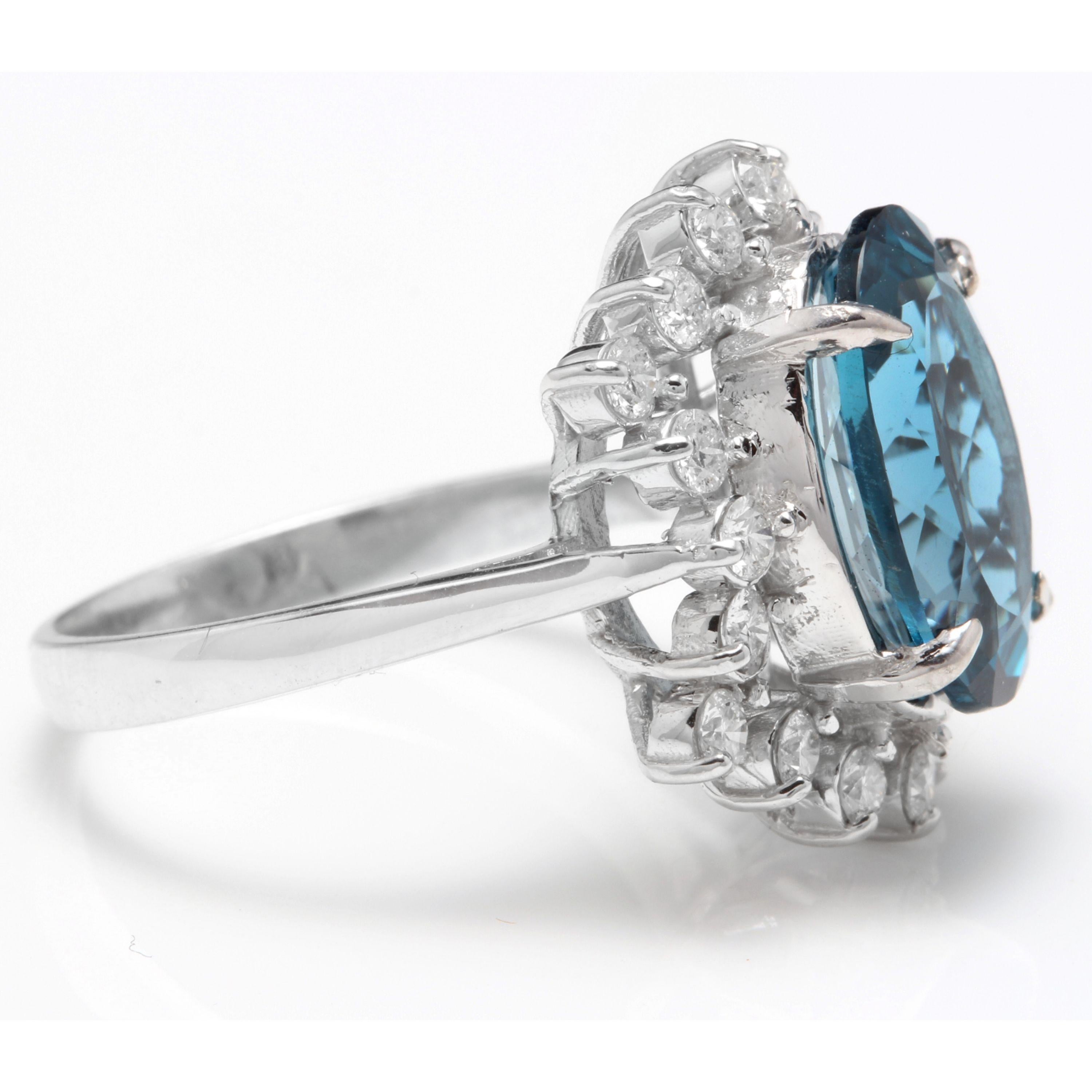 Mixed Cut 6.90 Carat Natural Impressive London Blue Topaz and Diamond 14 Karat Gold Ring For Sale