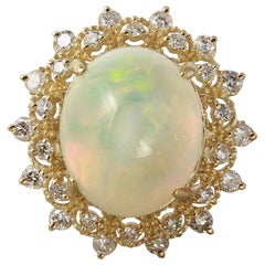 6,90 Karat natürlicher beeindruckender äthiopischer Opal und Diamant 14 Karat massiver Goldring