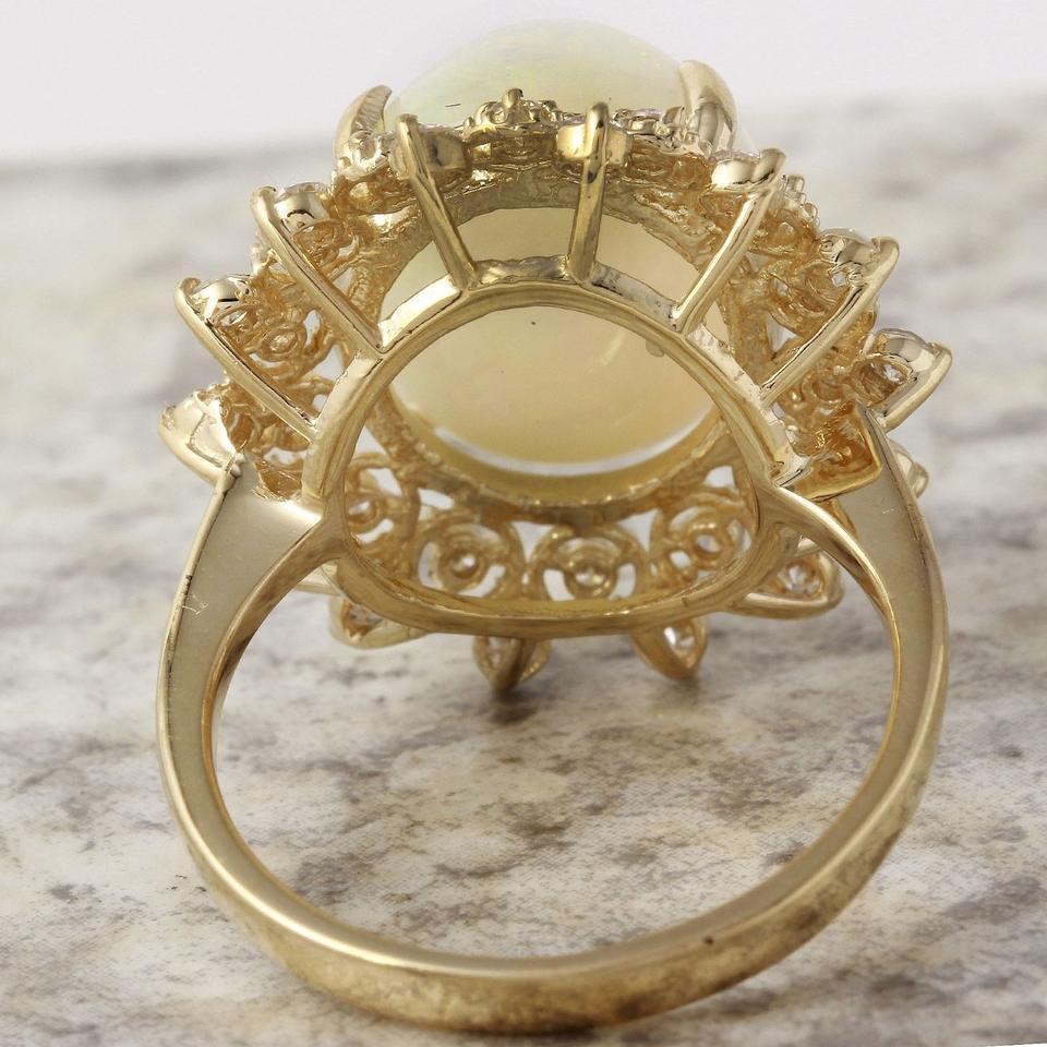 6.90 Ct Natural Impressive Ethiopian Opal and Diamond 14 Karat Solid Gold Ring In New Condition For Sale In Los Angeles, CA