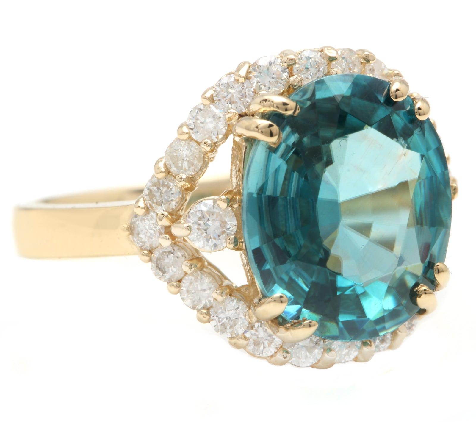 6.90 Carats Natural Very Nice Looking Blue Zircon and Diamond 14K Yellow Gold Ring

Suggested Replacement Value: 7,000.00

Total Natural Cushion Shaped Zircon Weights: Approx. 6.00 Carats 

Zircon Measures: Approx. 12 x 10mm

Natural Round Diamonds