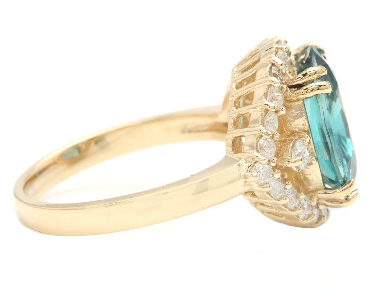 Mixed Cut 6.90 Ct Natural Very Nice Looking Blue Zircon and Diamond 14K Yellow Gold Ring For Sale