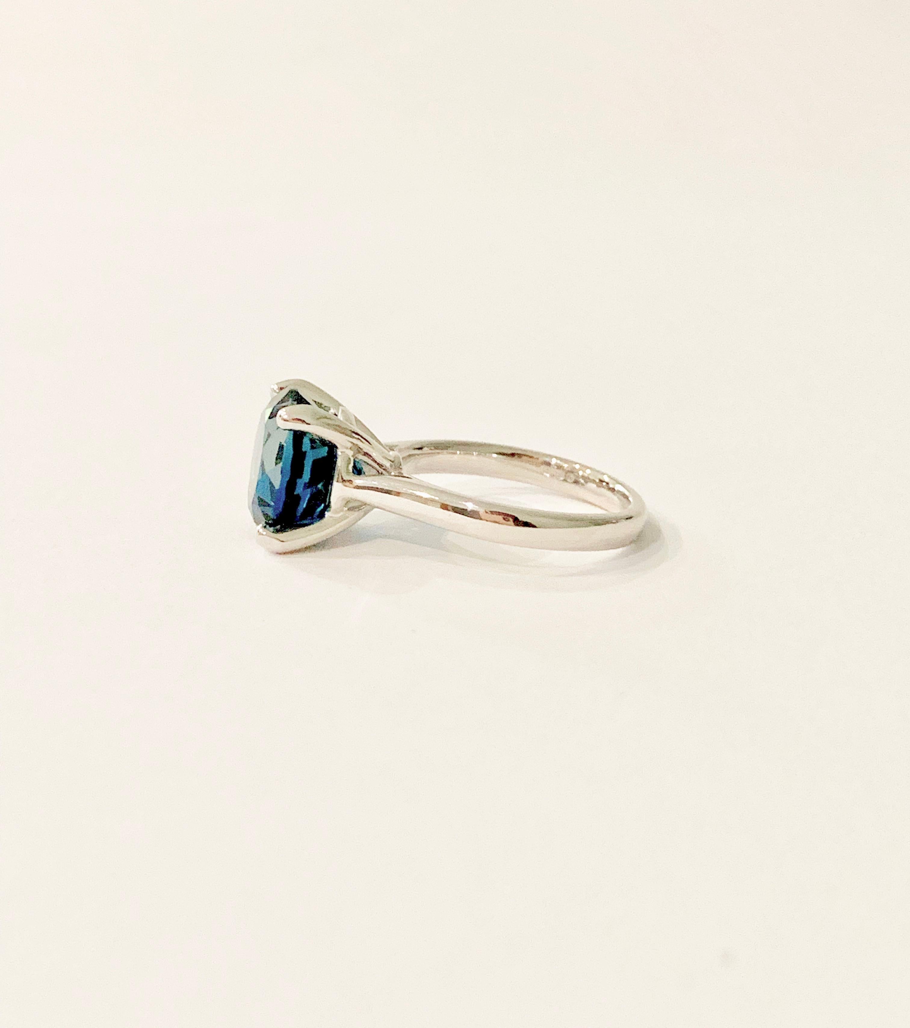 The premium round cut London Blue Topaz* has been set in a simple, but substantial,  four claw 18ct White Gold setting.  Making this design very contemporary with gorgeous clean lines.

The 6.90 ct London Blue Topaz has a wonderful rich velvety blue
