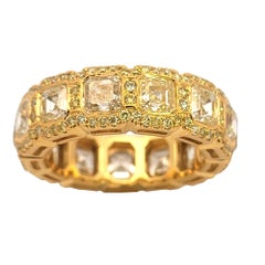 6.92 Carat Bezel Set Asscher cut Yellow Diamond 18 Karat Gold Eternity Ring