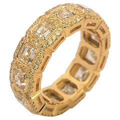 6.92 Carat Bezel Set Asscher cut Yellow Diamond 18 Karat Gold Eternity Ring