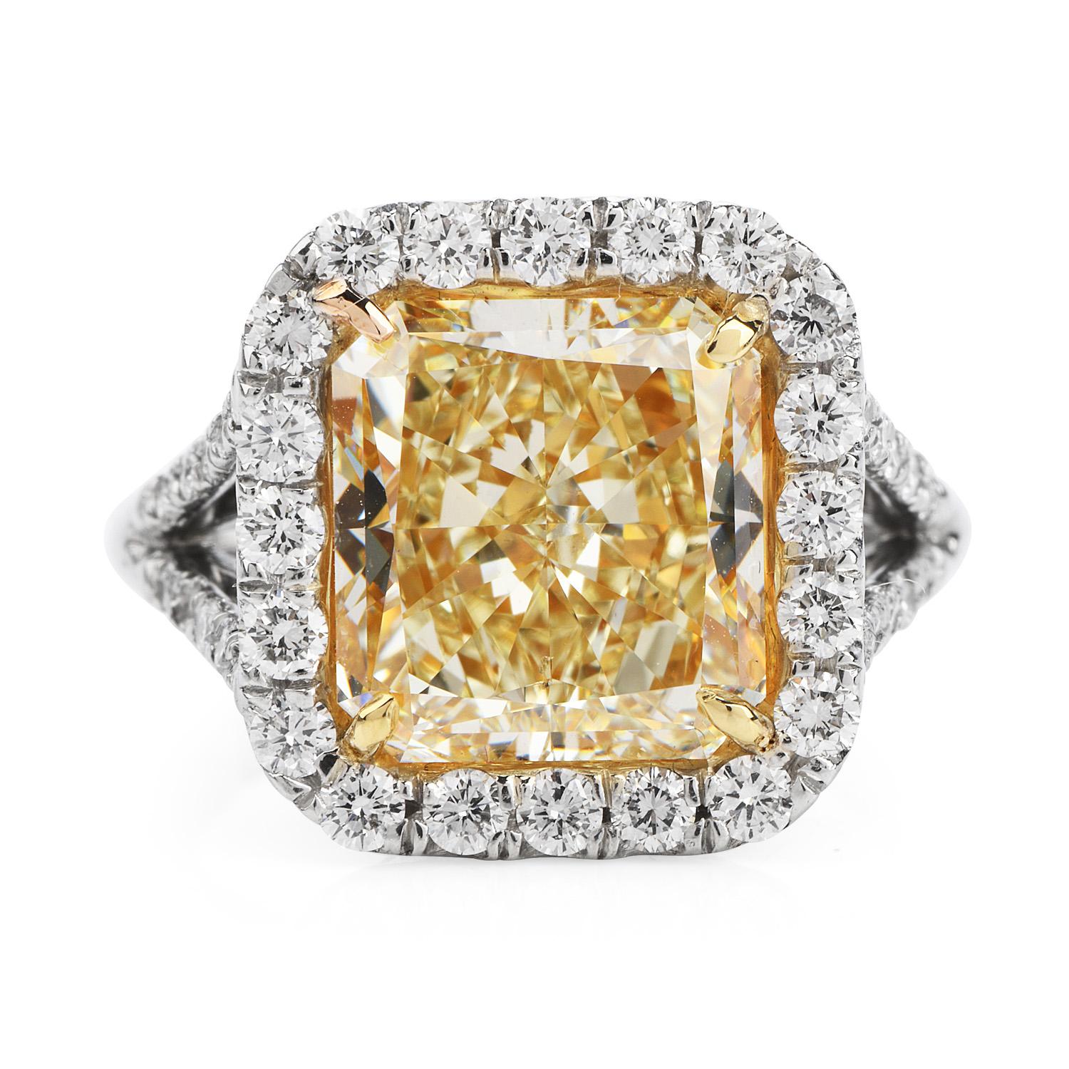 This absolutely glorious and luxurious yellow diamond engagement ring is for the fairy tale romance, full of luster and sparkle. Finely crafted in platinum,
it is centered with 1 genuine natural fancy yellow radiant cut diamond approx. 6.05 carat,