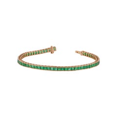 Pulsera Línea Tenis Esmeralda Clara Fina de 6,93 Quilates en Engaste Canal de Oro de 18k