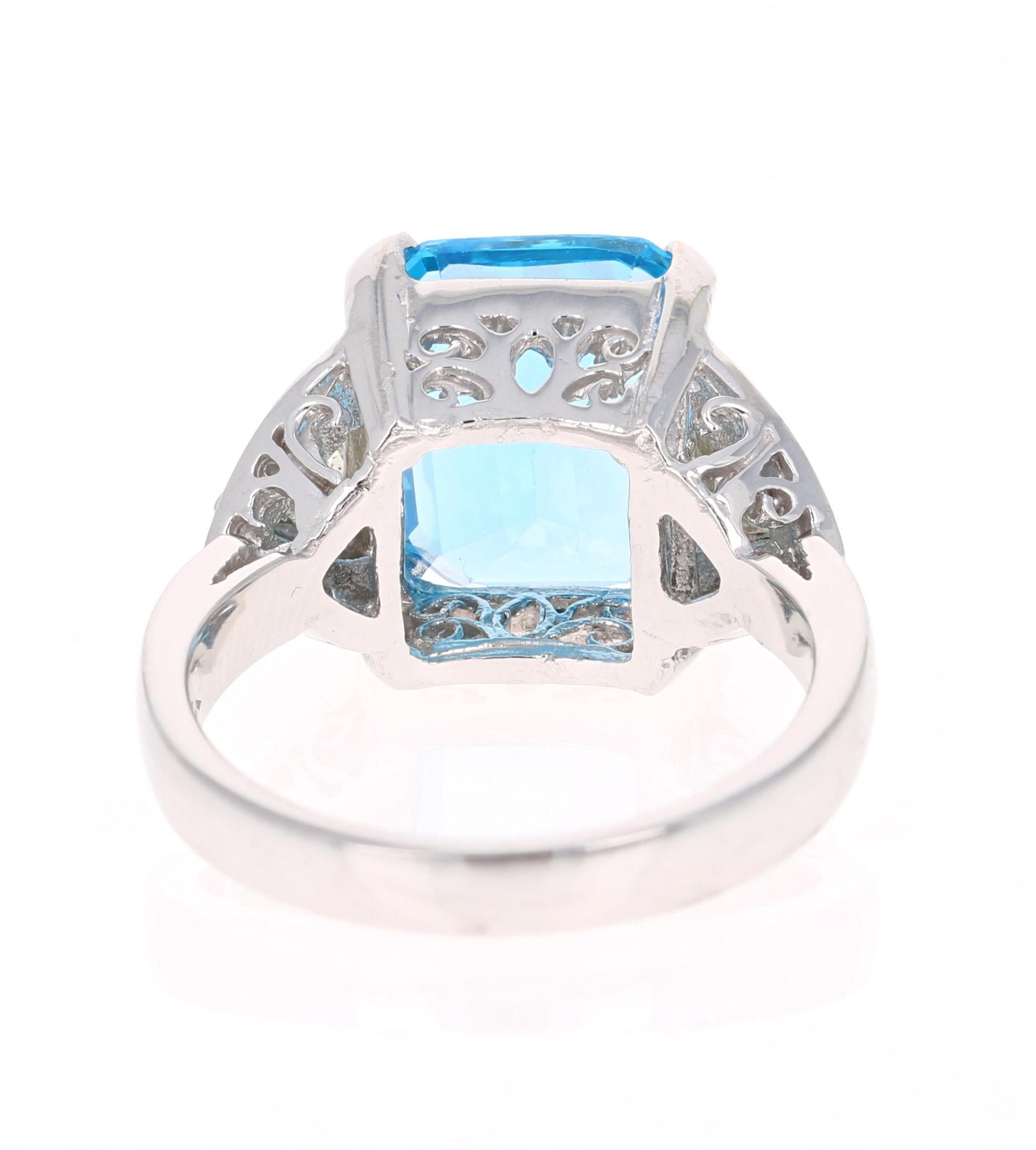 Emerald Cut 6.94 Carat Blue Topaz Diamond 14 Karat White Gold Ring