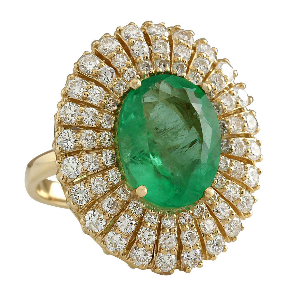 Presenting our captivating 6.94 Carat Emerald 14 Karat Yellow Gold Diamond Ring. Crafted from stamped 14K Yellow Gold, this ring boasts a total weight of 6.5 grams, ensuring both quality and durability. The centerpiece is a stunning emerald gemstone