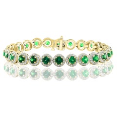 6.94 Carat Emerald and Diamond Halo Tennis Bracelet in 14k Yellow Gold