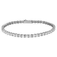 Bracelet tennis est-ouest en or blanc 18 carats avec diamants taille émeraude de 6,94 carats 