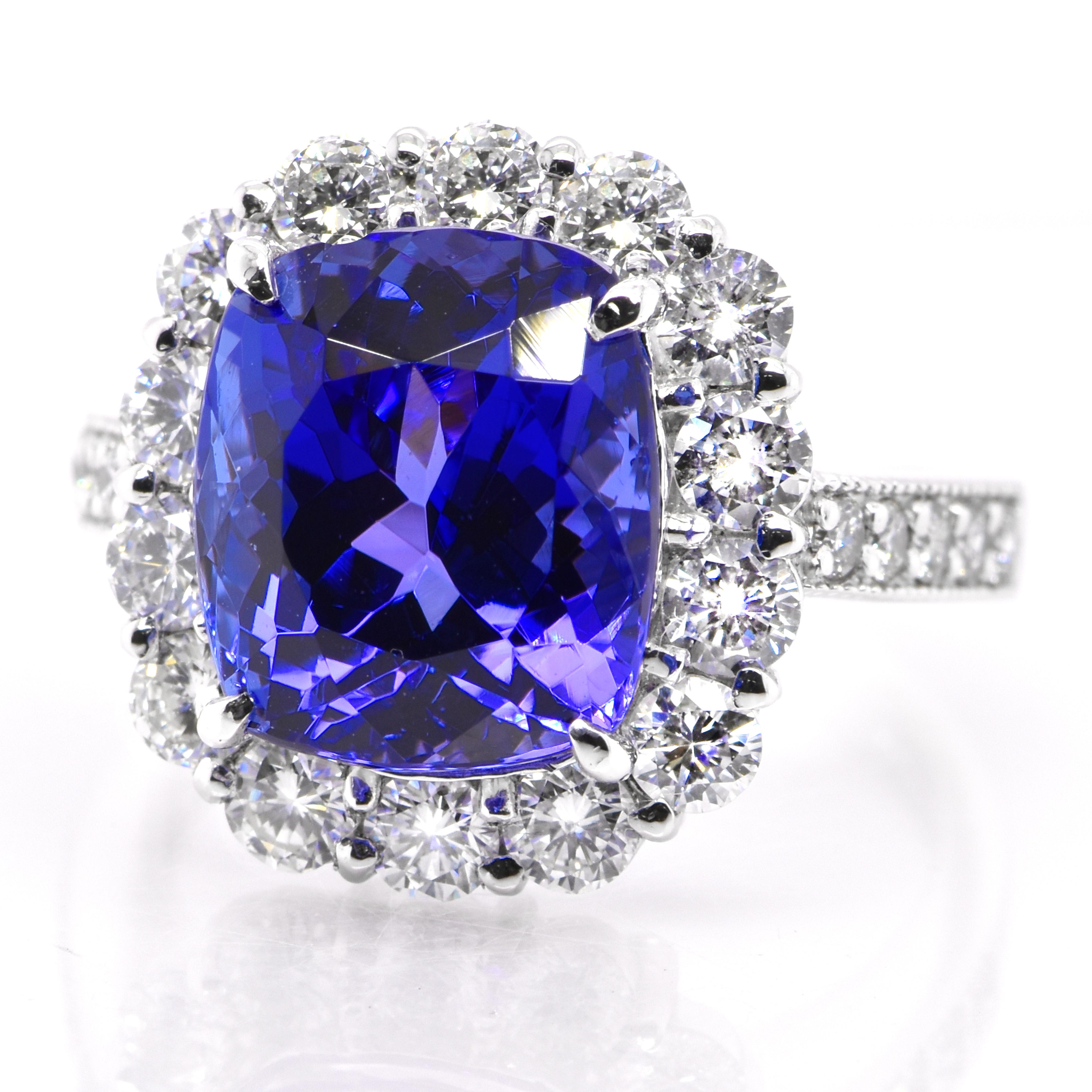 A beautiful ring featuring a 6.94 Carat Natural Tanzanite and 1.44 Carats Diamond Accents set in Platinum. Tanzanite's name was given by Tiffany and Co after its only known source: Tanzania. Tanzanite displays beautiful pleochroic colors meaning