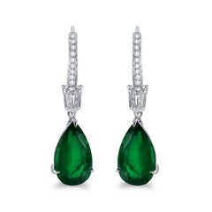 6.94 Carat Pear Shape Emerald Earrings in 0.91 Diamond Halo ref e540