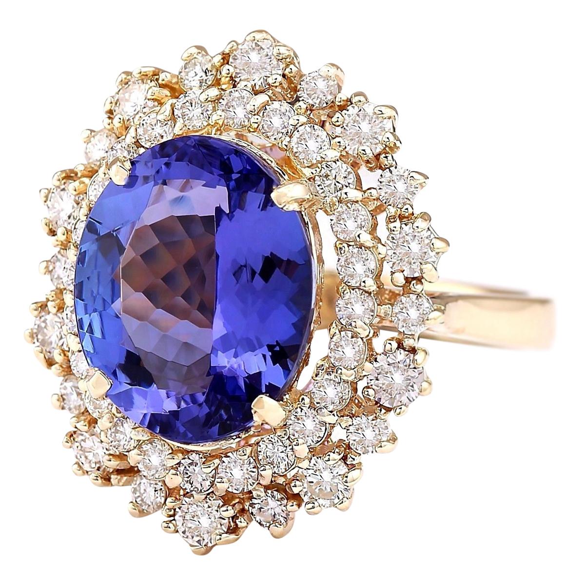 6.95 Carat Tanzanite 14 Karat Yellow Gold Diamond Ring
Stamped: 14K Yellow Gold
Total Ring Weight: 7.8 Grams
Total  Tanzanite Weight is 5.80 Carat (Measures: 14.00x10.00 mm)
Color: Blue
Total  Diamond Weight is 1.15 Carat
Color: F-G, Clarity:
