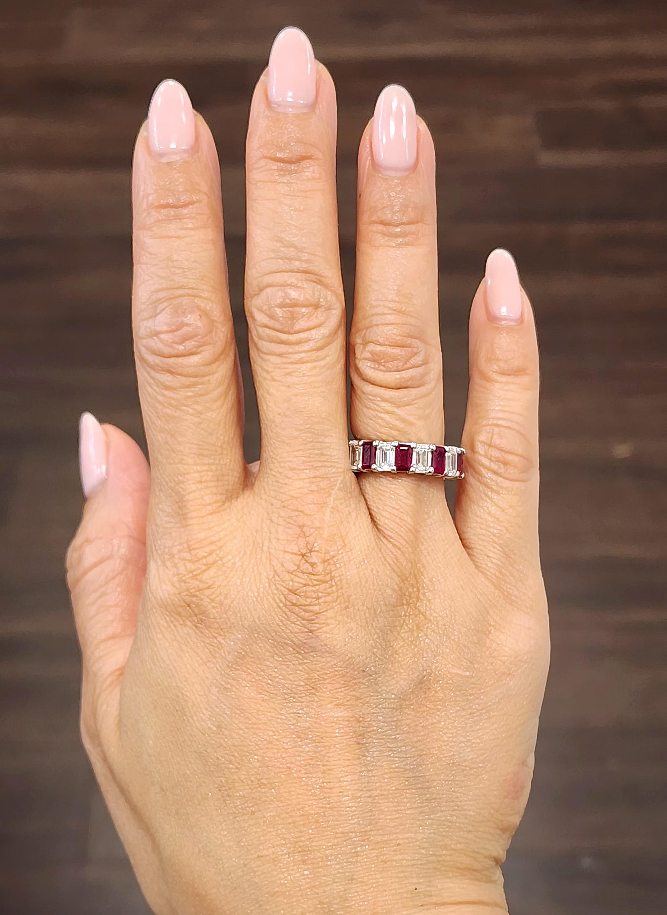 A natural emerald cut ruby and diamond eternity band is a stunning and timeless piece of jewelry that is perfect for any occasion. The striking combination of the deep red ruby and the brilliant diamonds creates a mesmerizing effect that catches the