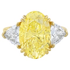 6.95 Ct Oval Cut Fancy Yellow Three Stone Diamond Engagement Ring