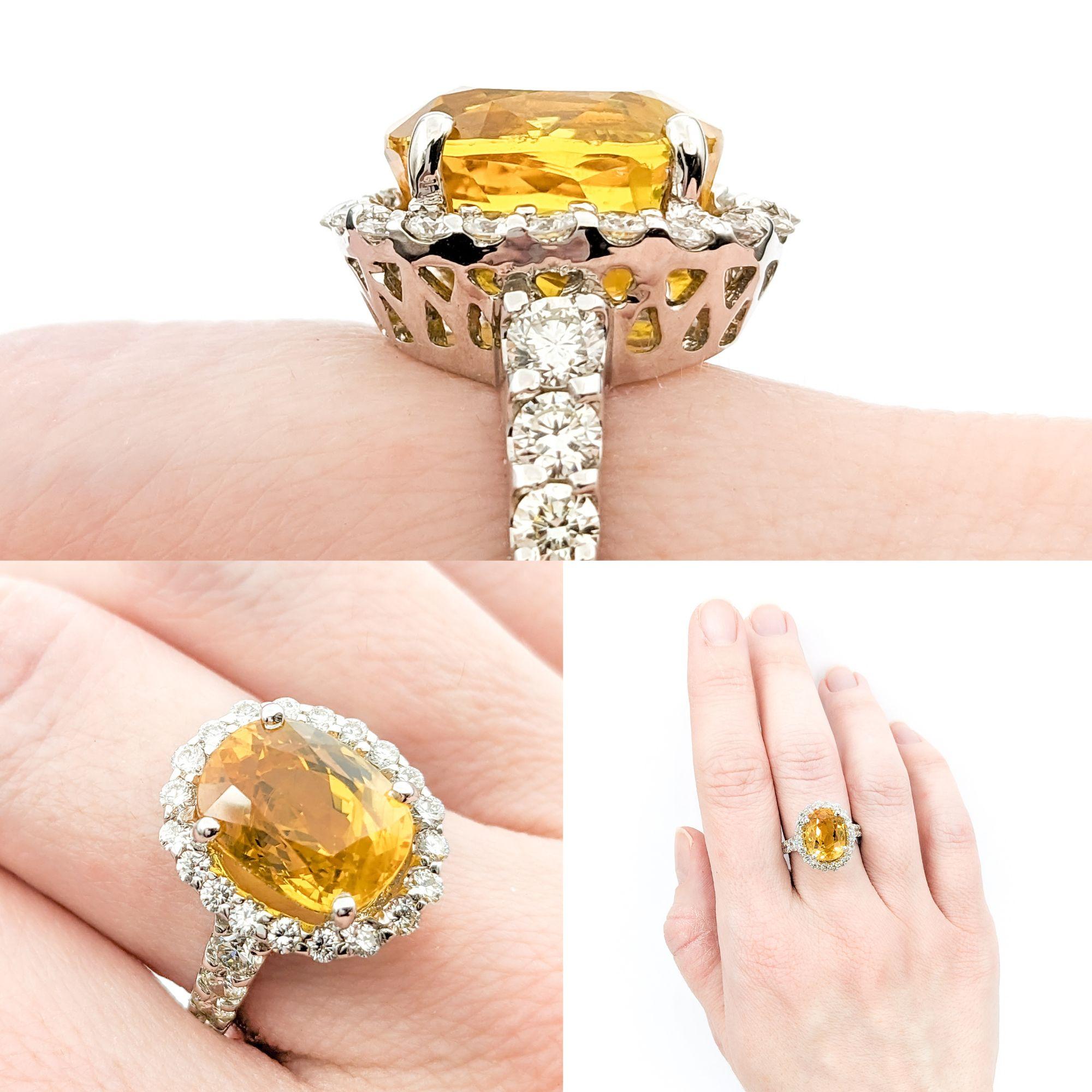 6.95ct Yellow Sapphire & 1.42ctw Diamond Ring In White Gold


This stunning ring, designed in 14kt white gold, showcases a dazzling array of 1.42ctw round diamonds, each selected for their SI clarity and near colorless brilliance. At the heart of