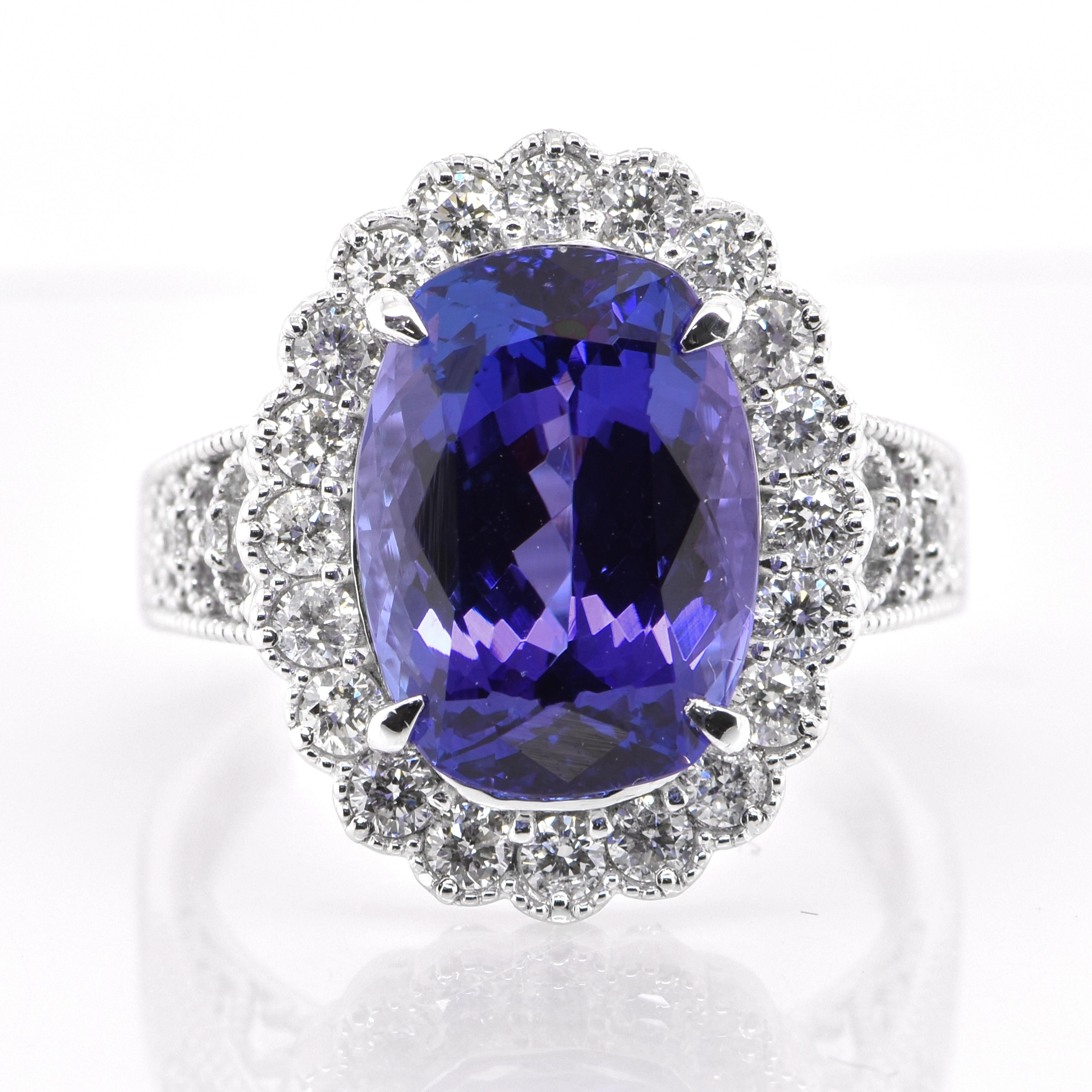 A beautiful Cocktail Ring featuring a 6.96 Carat Natural Tanzanite and 0.71 Carats of Diamond Accents set in Platinum. Tanzanite's name was given by Tiffany and Co after its only known source: Tanzania. Tanzanite displays beautiful pleochroic colors