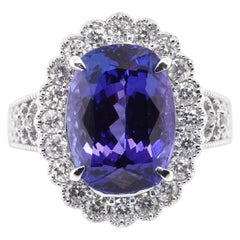 Antique 6.96 Carat Natural Tanzanite and Diamond Edwardian Inspired Ring Set in Platinum