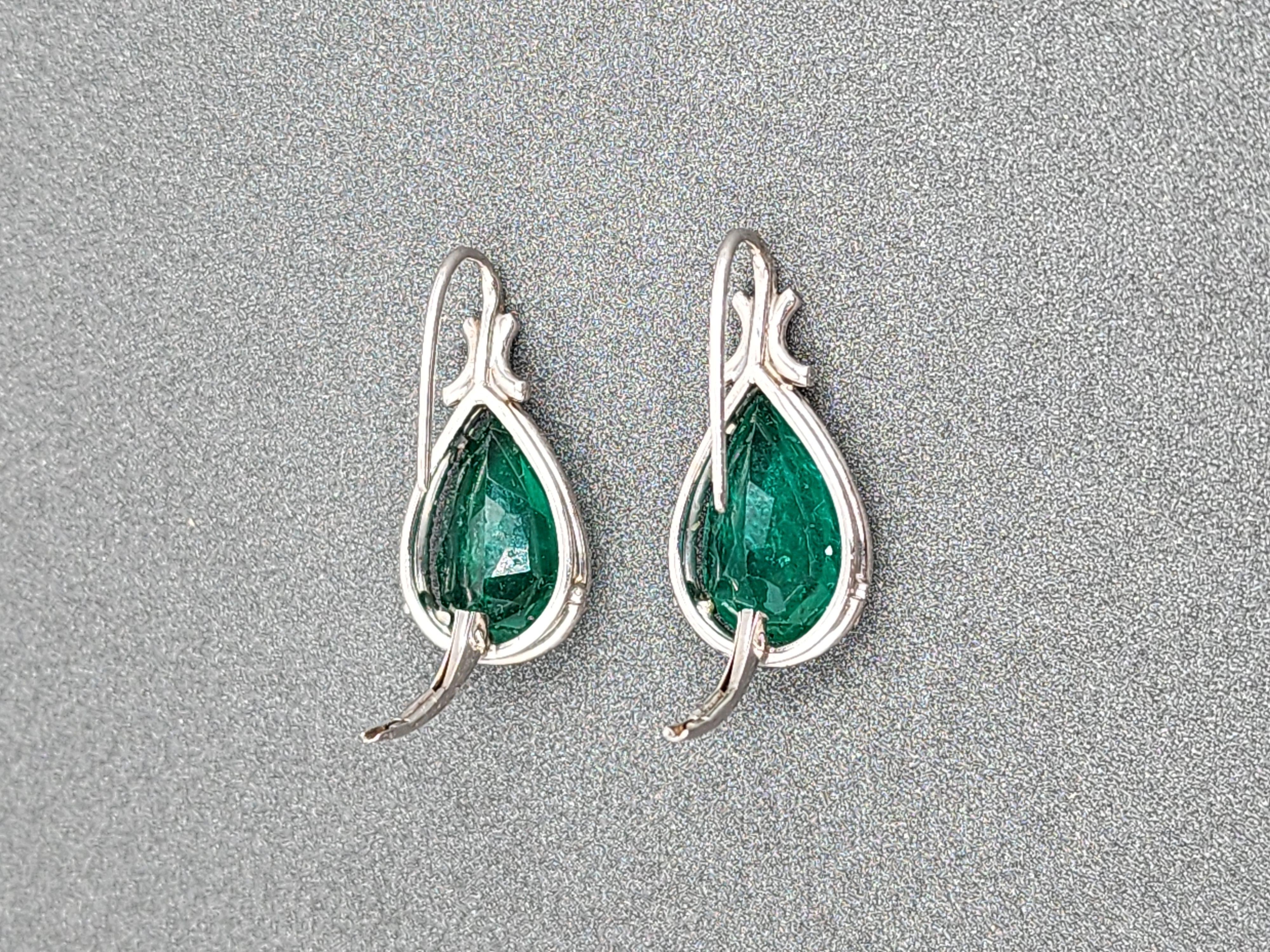Pear Cut 6.96 ct Natural Pear Shape Emerald Earrings For Sale