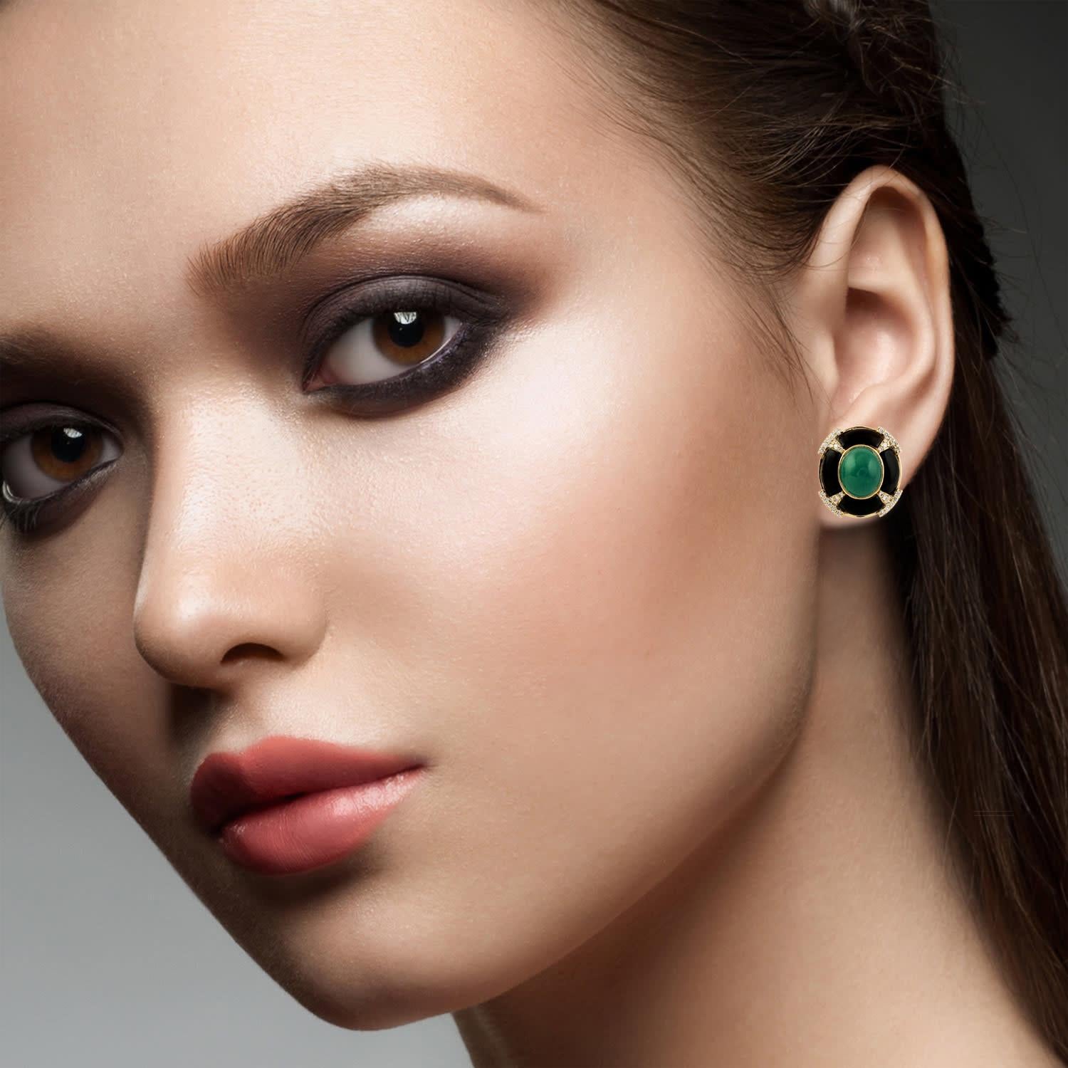 Handcrafted from 14-karat gold, these beautiful stud earrings are set with 6.97 carats emerald, 5.51 carats onyx and .43 carats of sparkling diamonds.

FOLLOW  MEGHNA JEWELS storefront to view the latest collection & exclusive pieces.  Meghna Jewels