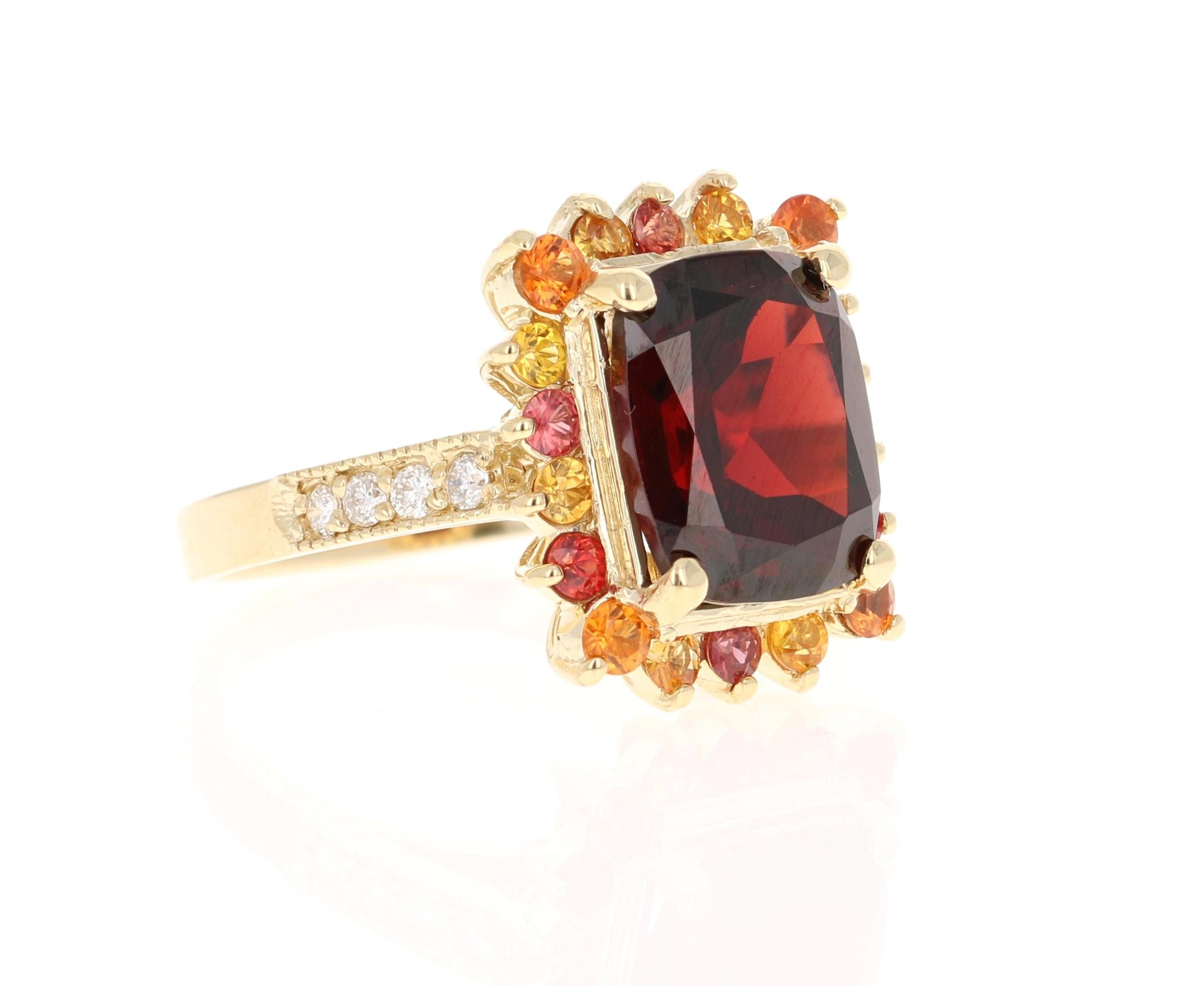 6.97 Carat Garnet Sapphire Diamond Yellow Gold Cocktail Ring

This ring has a Oval/Cushion Cut Garnet weighing 5.63 carats and is surrounded by multicolored sapphires weighing 1.17 carats. In addition to the sapphires there are 8 Round Cut Diamonds