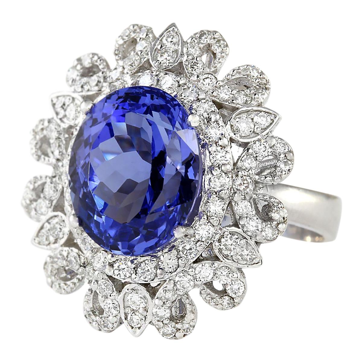 Introducing our stunning 6.97 Carat Tanzanite 14 Karat White Gold Diamond Ring. Crafted from stamped 14K White Gold, this ring boasts a total weight of 8.5 grams, ensuring both quality and durability. At its center shines a mesmerizing Tanzanite