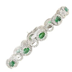 6.98 Carat Emerald 18 Karat White Gold Diamond Bracelet