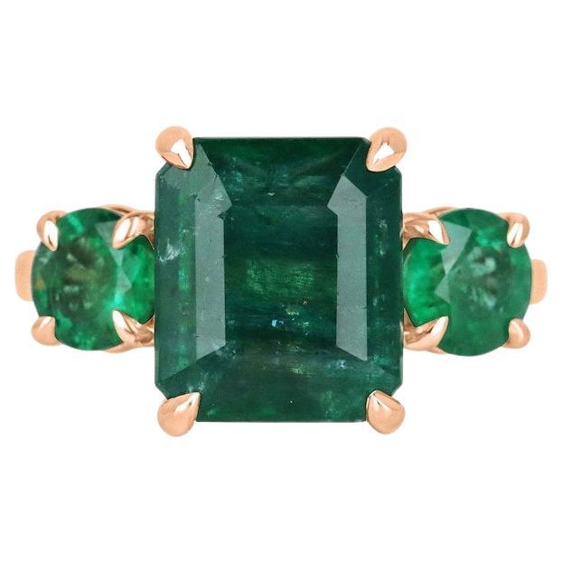 6.98tcw 14K Emerald Cut & Round Emerald Trilogy Ring - Deep Green 585 Rose Gold