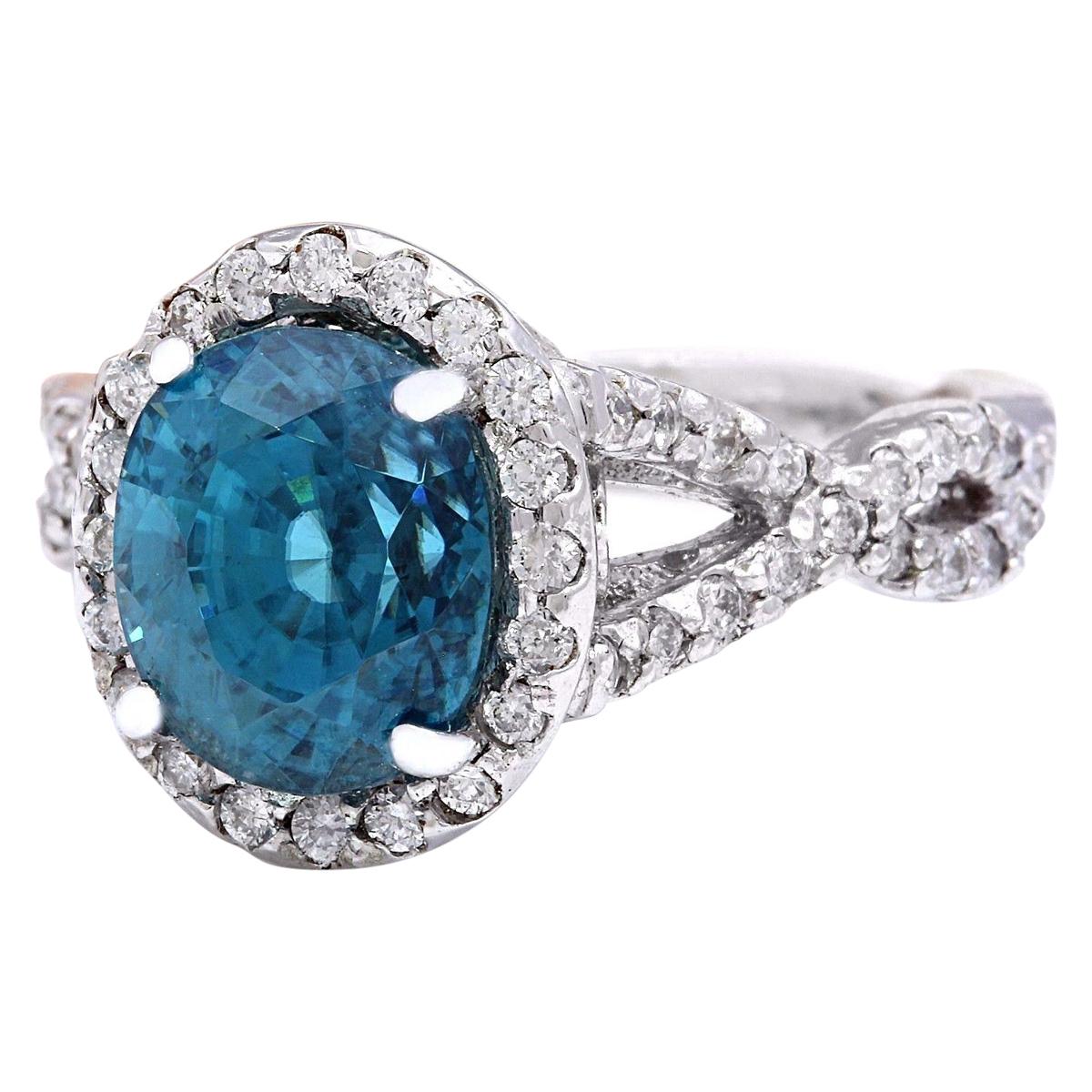 6.99 Carat Natural Zircon 14K Solid White Gold Diamond Ring
 Item Type: Ring
 Item Style: Engagement
 Material: 14K White Gold
 Mainstone: Zircon
 Stone Color: Blue
 Stone Weight: 6.09 Carat
 Stone Shape: Oval
 Stone Quantity: 1
 Stone Dimensions: