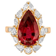 6.991 Carat Rubelite Fancy Ring in 18Karat Yellow Gold with White Diamond.