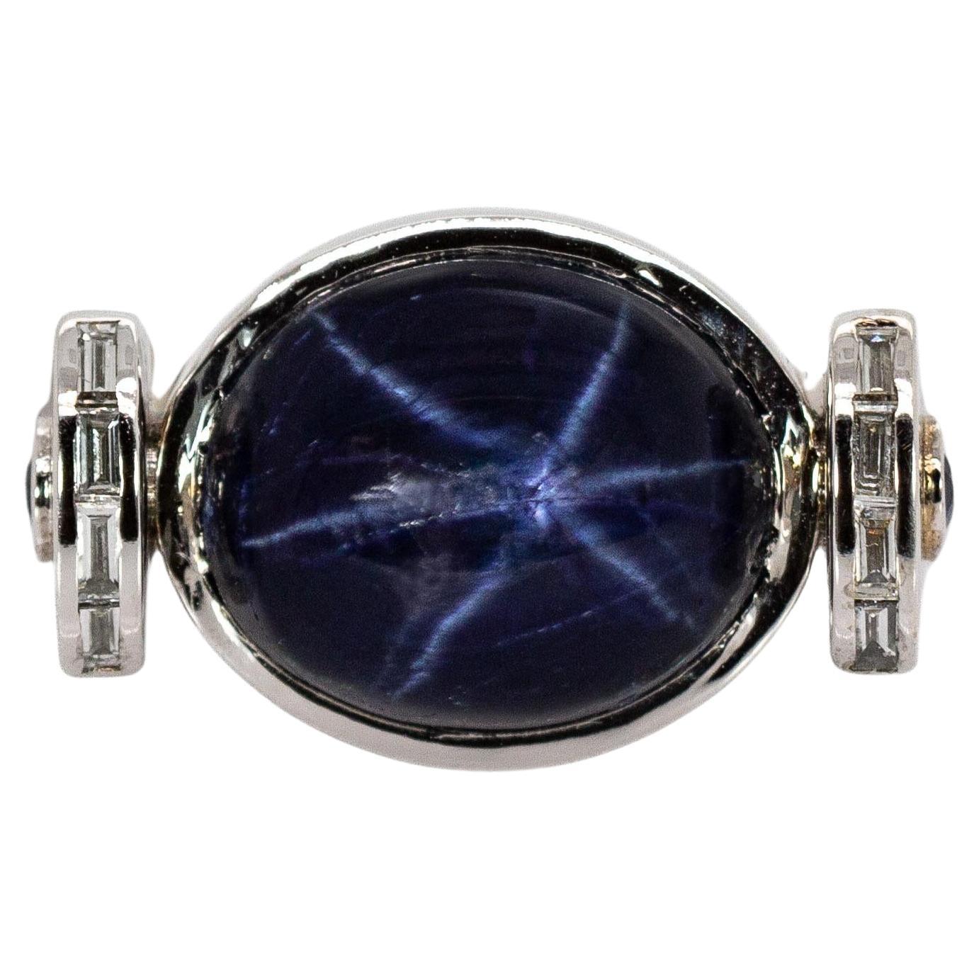 Bague saphir étoilé 6,9cts avec saphir bleu et diamants en or massif 14K en vente