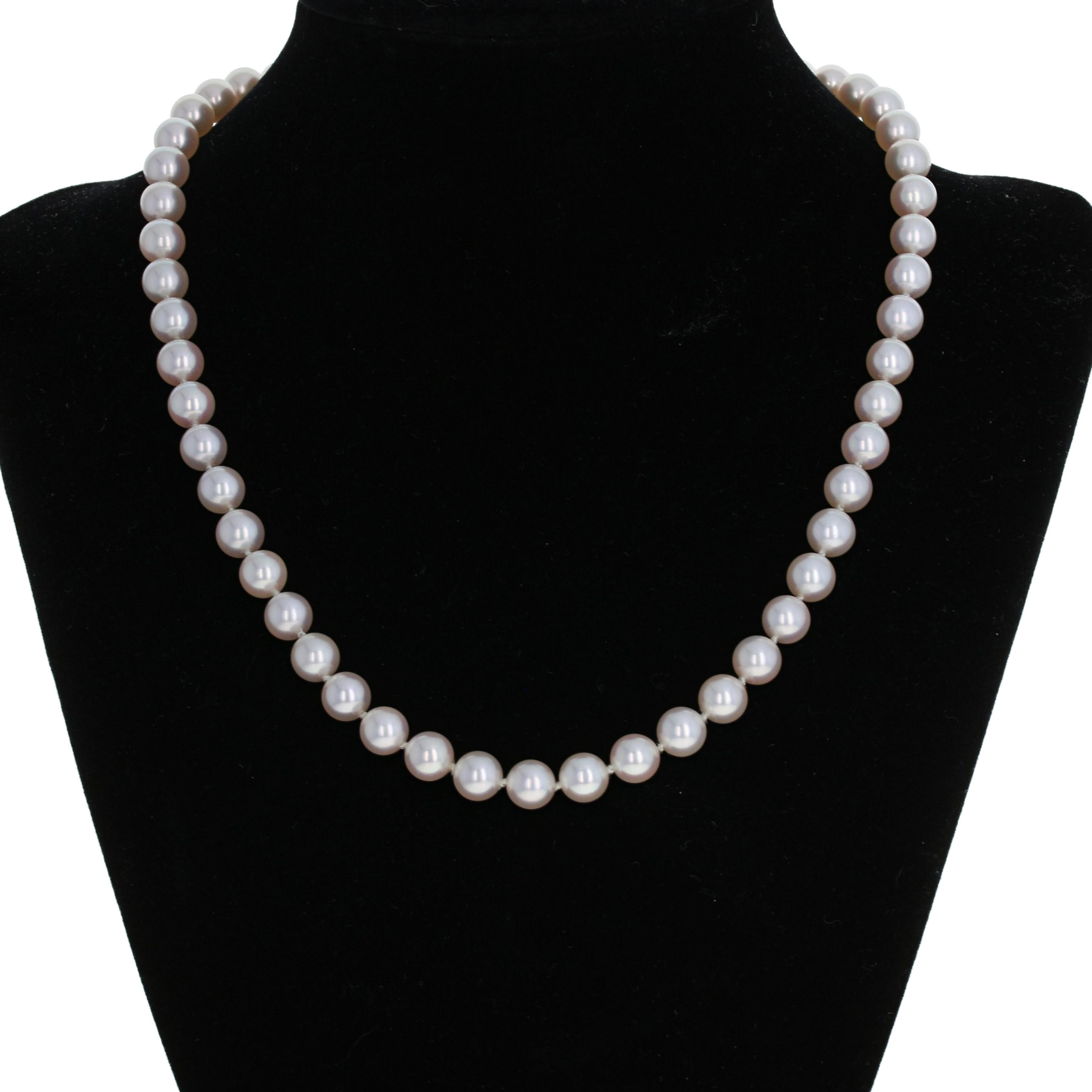 Metal Content: Guaranteed 14k Gold as stamped

Stone Information: 
Akoya Pearls
Diameter: 6.9mm
Accent's Diameter (on clasp): 6.4mm

Style: Knotted Strand
Measurements: length 16 1/2