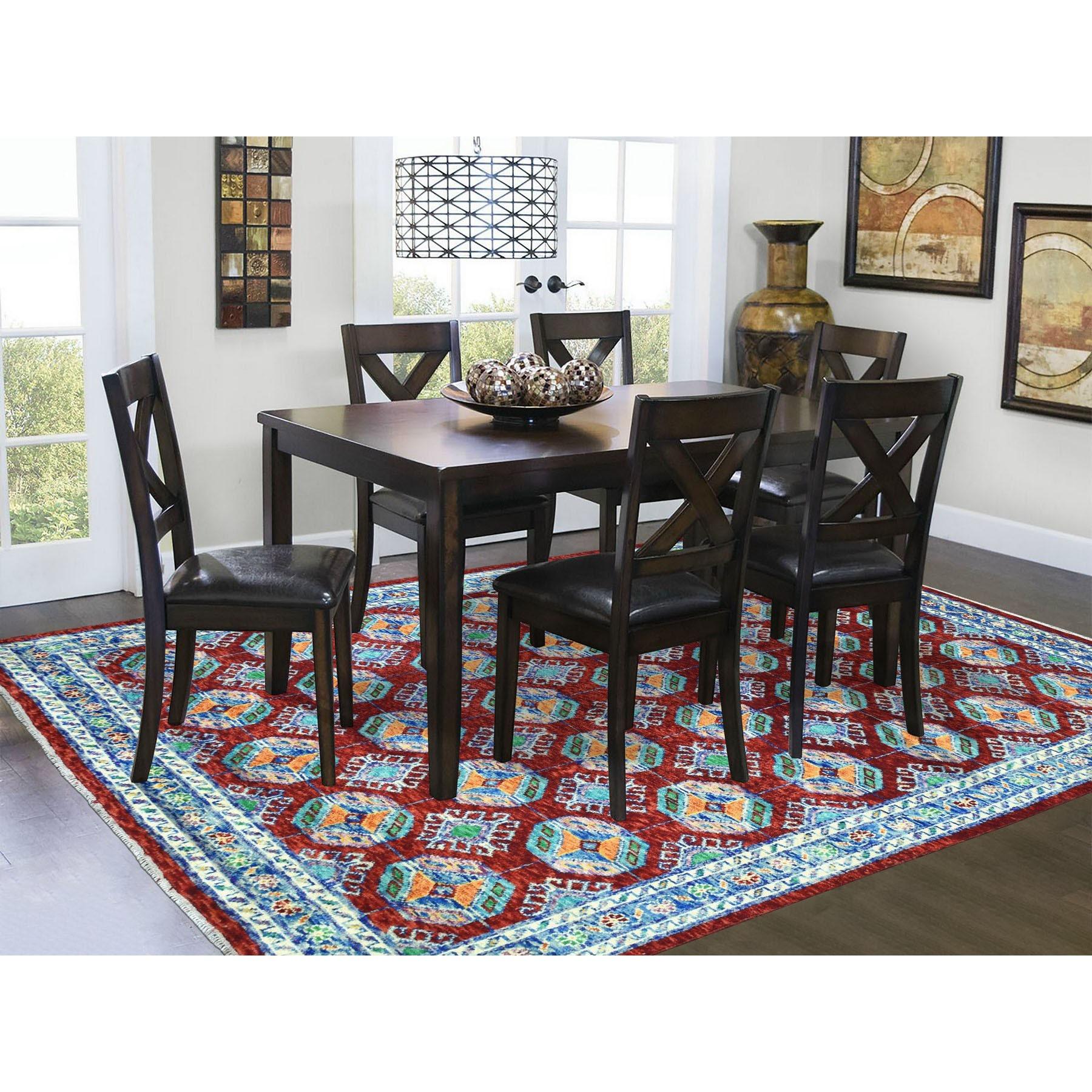 This is a truly genuine one-of-a-kind Red Elephant Feet Design Colorful Afghan Baluch Hand Knotted Pure Wool Oriental Rug. It has been woven for months and months in the centuries-old Persian weaving craftsmanship techniques by expert