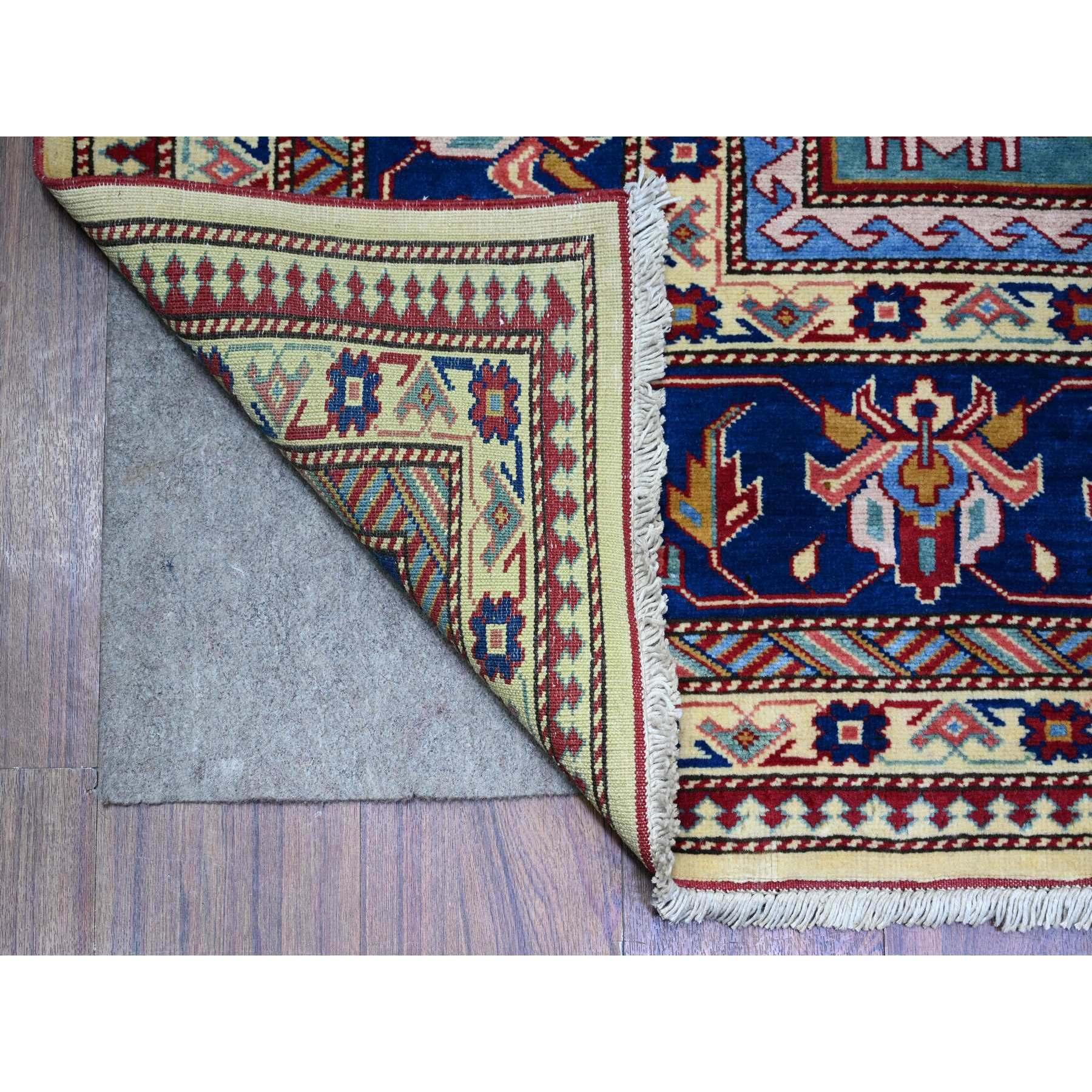 This is a truly genuine one-of-a-kind Afghan Super Kazak, Hand Knotted, Pure Wool, Oriental Rug. It has been Knotted for months and months in the centuries-old weaving craftsmanship techniques by expert artisans.
Primary materials: Wool
Latex: No