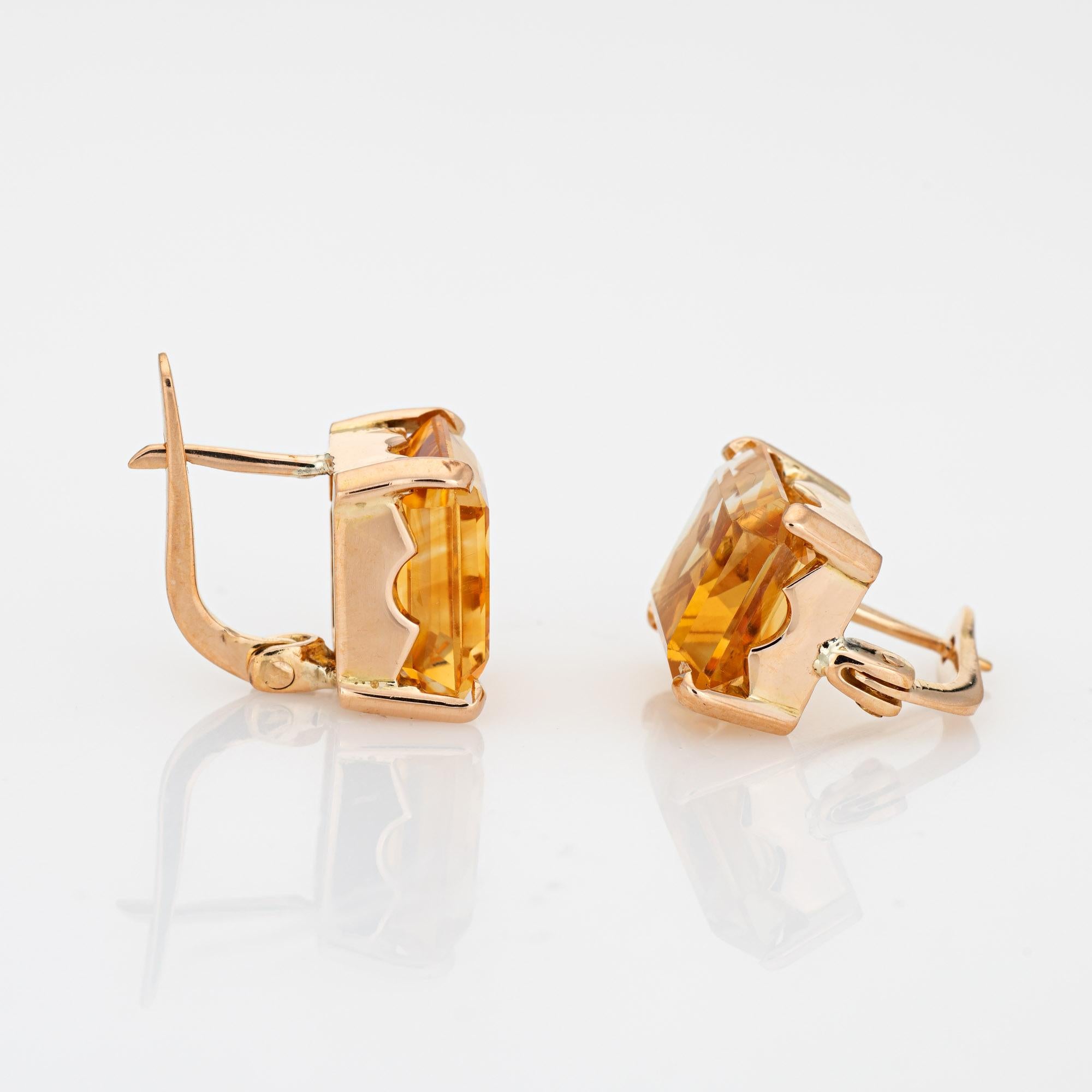Elegant pair of retro vintage citrine square stud earrings crafted in 14k rose gold (circa 1940s to 1950s).

Emerald cut citrines measure 10mm x 9mm (estimated at 3 carats each - 6 carats total estimated weight).   

The stylish earrings feature