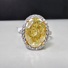 Rare Colors 6 Carat Fancy Light Yellow Oval Diamond Ring