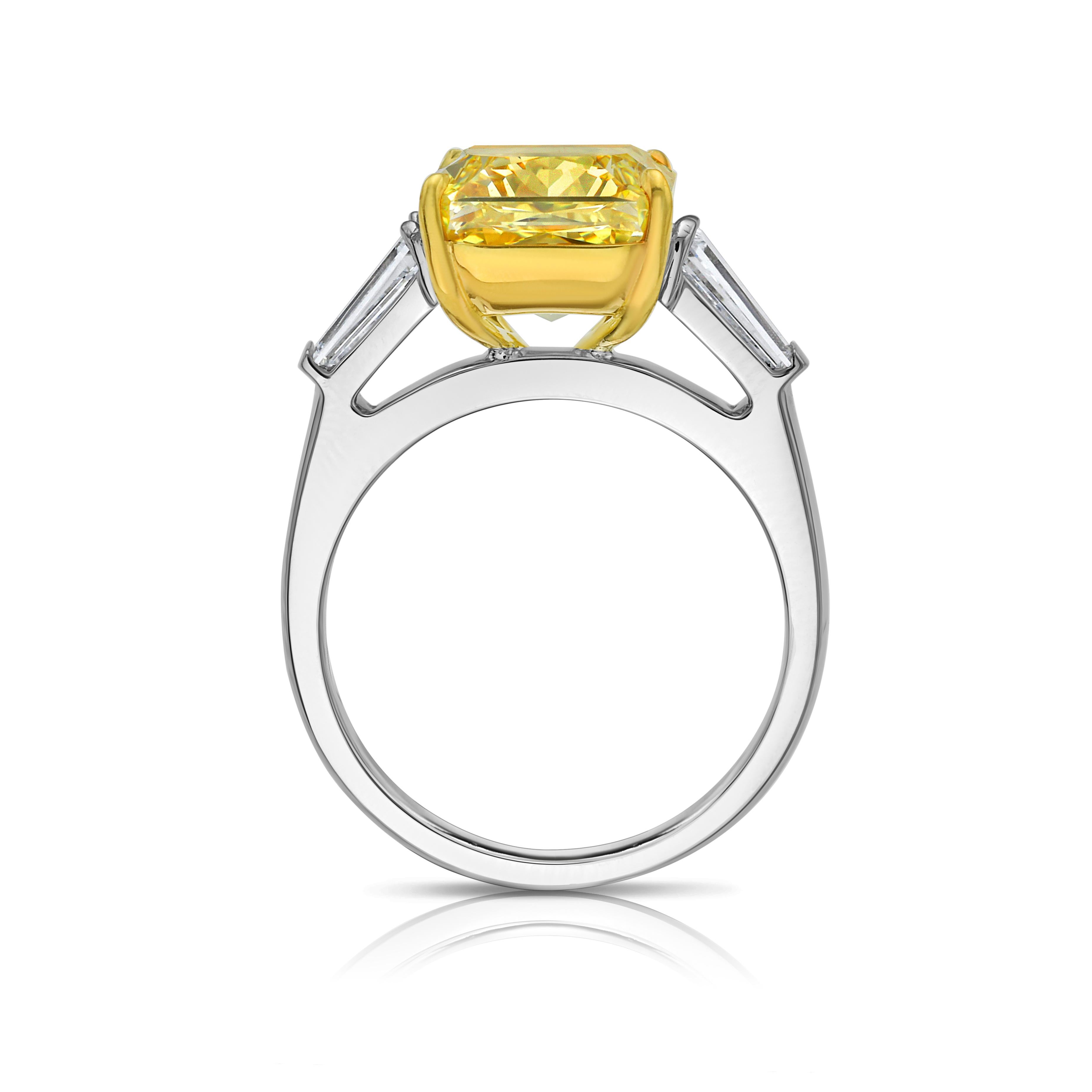 This 6 carat Fancy Intense Yellow diamond is a stunning testament to nature’s brilliance and rarity. Certified by GIA, the elongated radiant cut enhances its rich, saturated hue, creating a vibrant glow that captivates from every angle.

Adding to