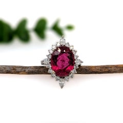 6ct Rubellite Statement Ring with a Natural Diamond Halo in Solid 14K Gold