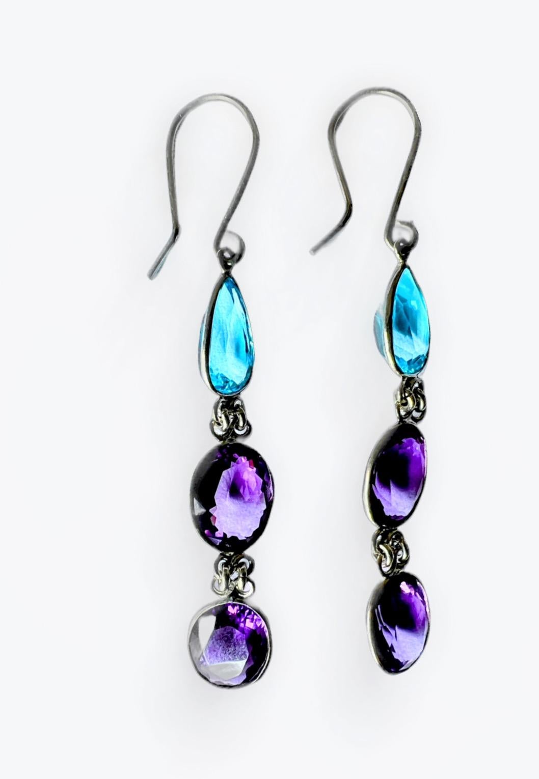 Contemporary 6ctw Blue Topaz and Amethyst Platinum Silver Drop Earrings For Sale