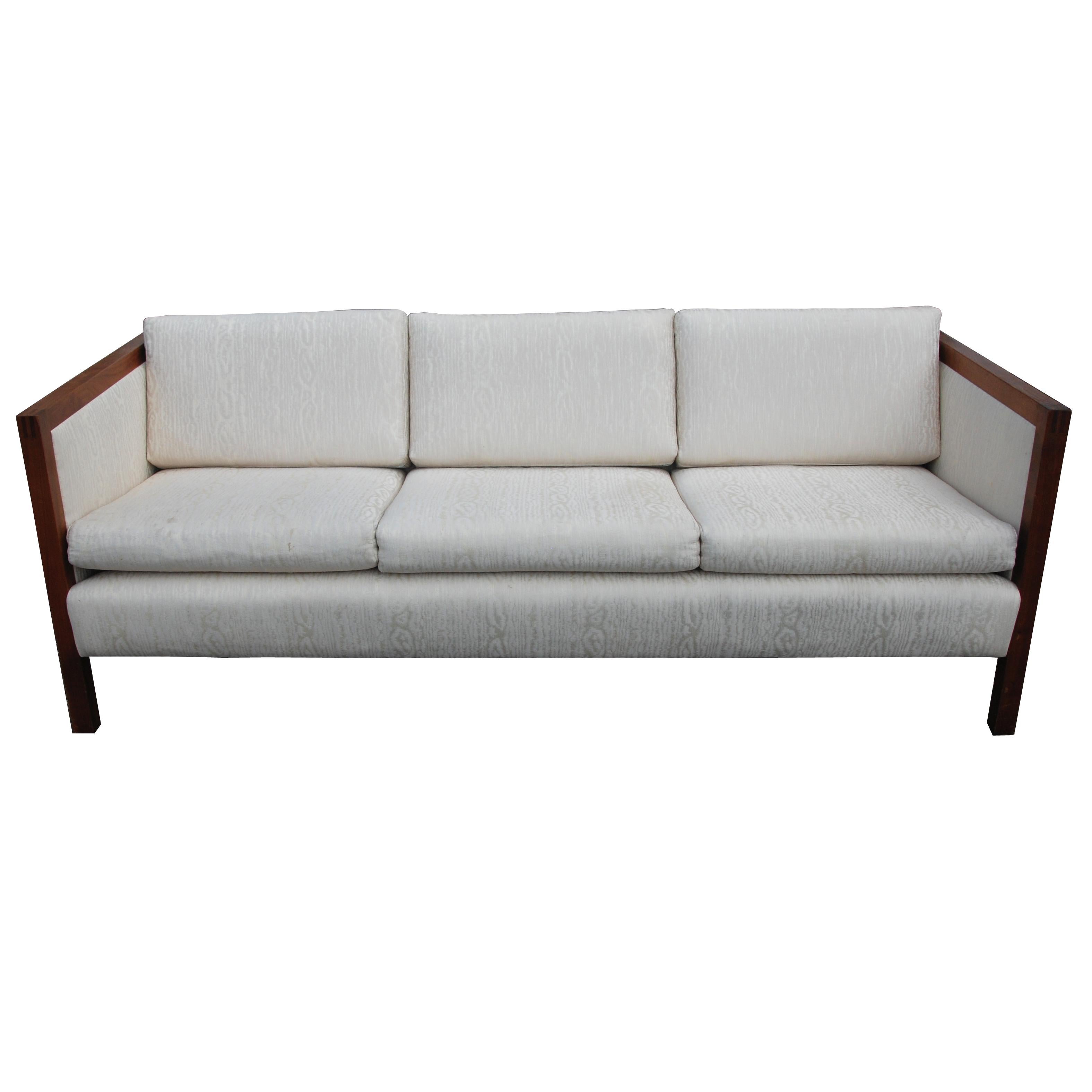 Classic lines with a trim in rich walnut with ivory upholstery. Measure: 6.5FT.

 