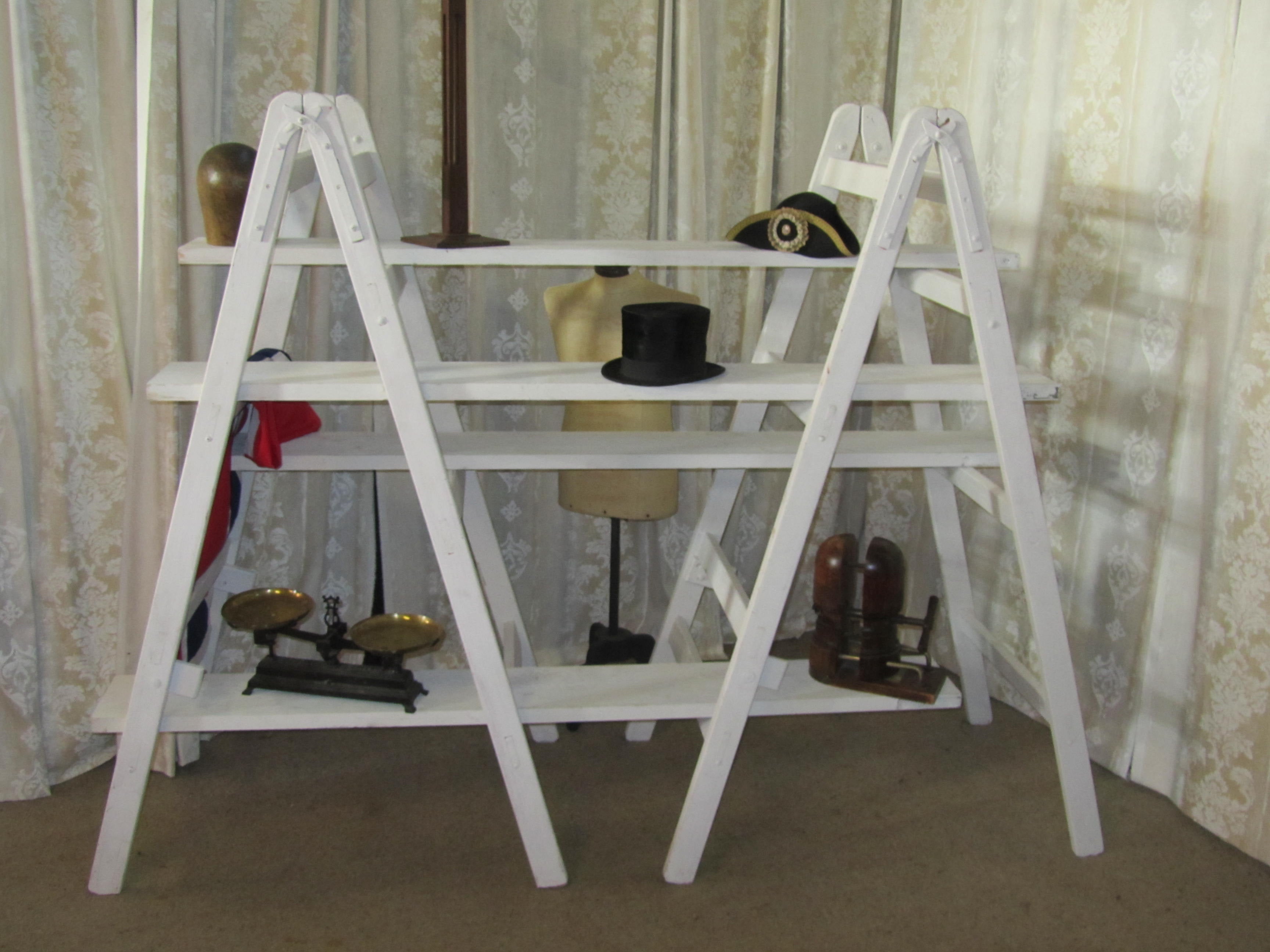 6ft Tall Shabby Painted Pair of Builder’s Trestles 
 
The Trestles come with long heavy boards, ideal for adjustable shop or any other display
 The Trestles have been roughly painted, the boards are a modern addition and have been painted to match,