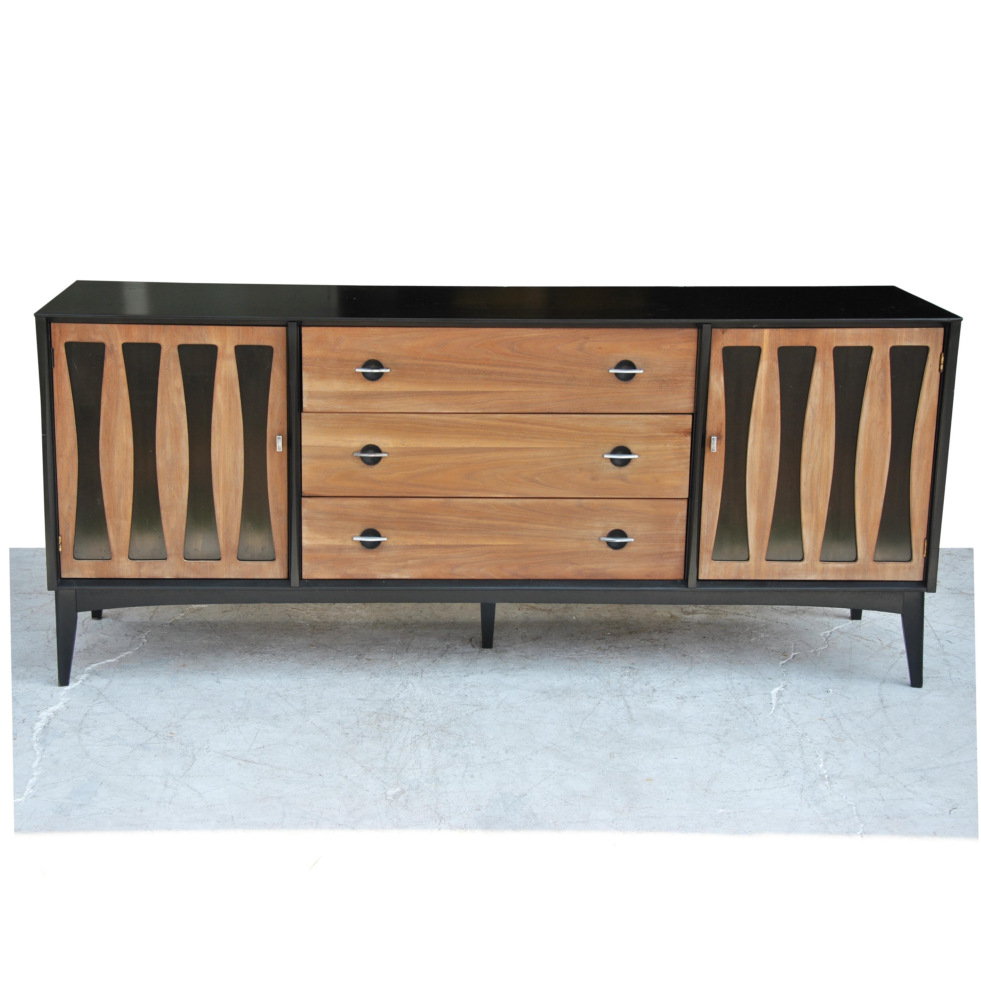 FT Vintage midcentury Dresser with Ebonized Case and Panels 

Featuring 3 drawers with an additional 6 revealed behind ebonized inlay doors. Walnut with chrome pulls. 
Measures:
6 ft W x 19