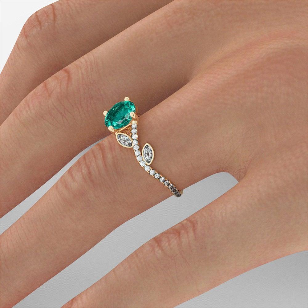 emerald flower engagement ring