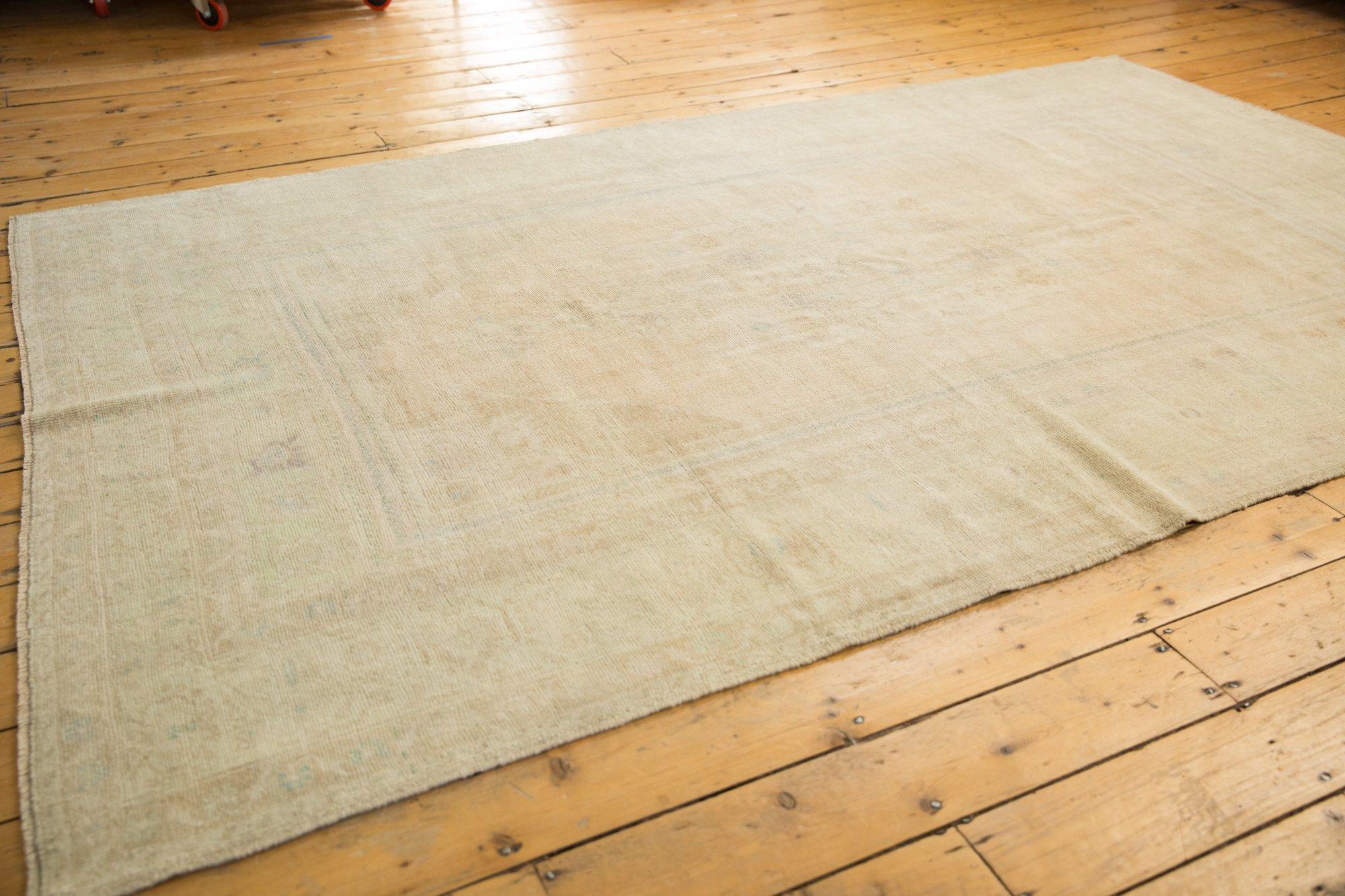 Late 20th Century Vintage Distressed Oushak Carpet For Sale