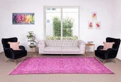 Handgefertigter türkischer Vintage-Teppich im eleganten Design in Rosa, überzogener Teppich