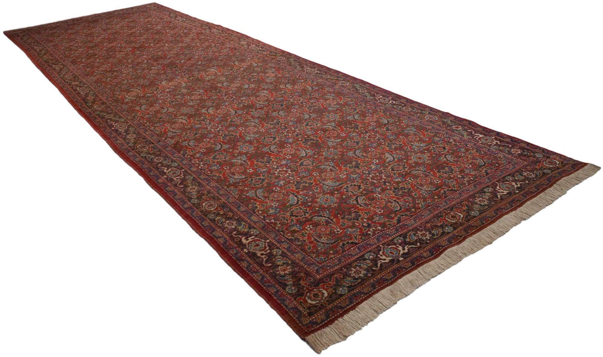 :: Allover covered field in a Herati motif with a narrow banded main border in a reciprocating turtle design. Colors and shades include: Brick red, powder blue, navy blue, dusty denim, sky blue, beige, mallard green, faded saffron yellow, and more.