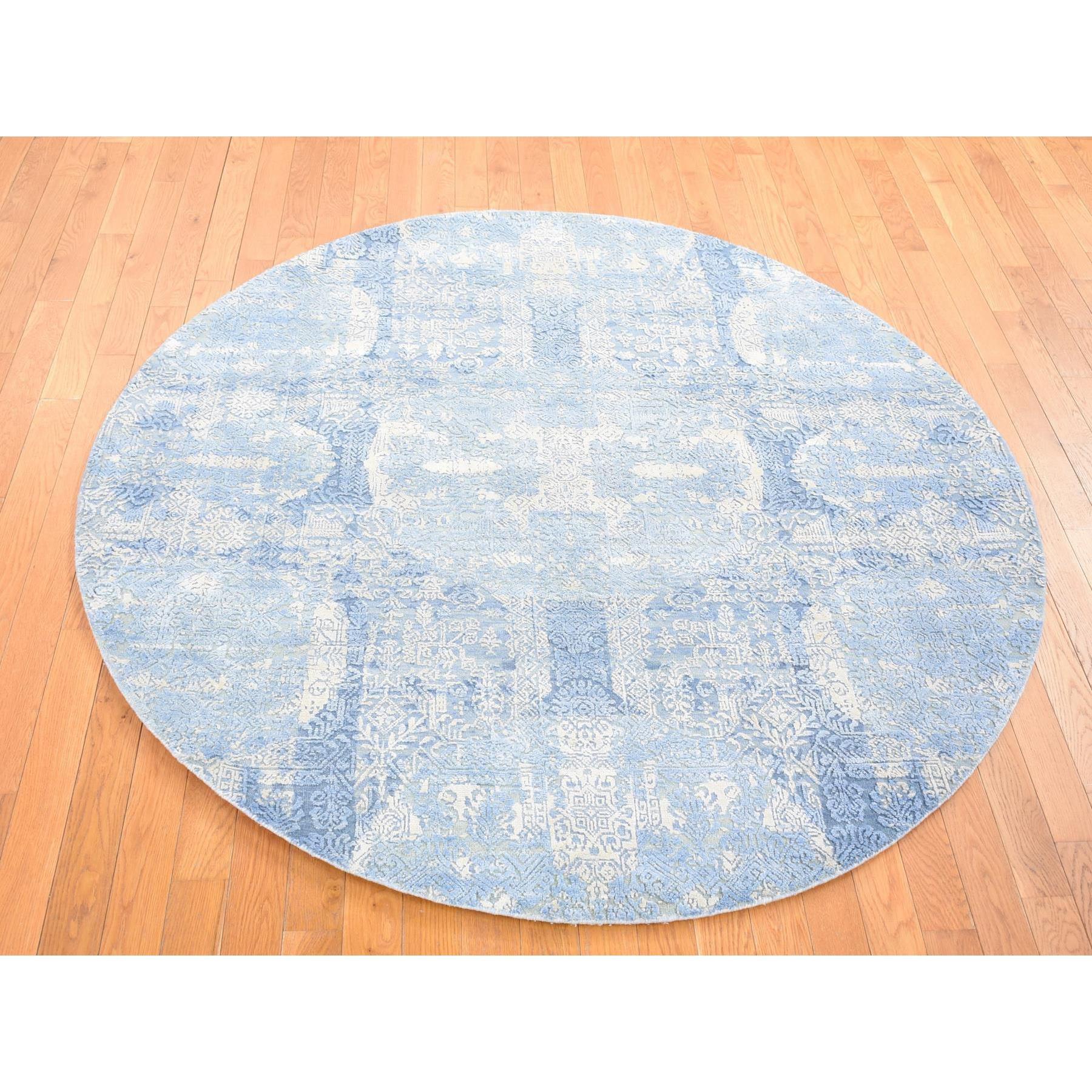 This is a truly genuine one-of-a-kind Blue Hand Knotted Wool and Pure Silk Jewellery Design with Soft Colors Round Oriental Rug. It has been Knotted for months and months in the centuries-old weaving craftsmanship techniques by exper
Primary