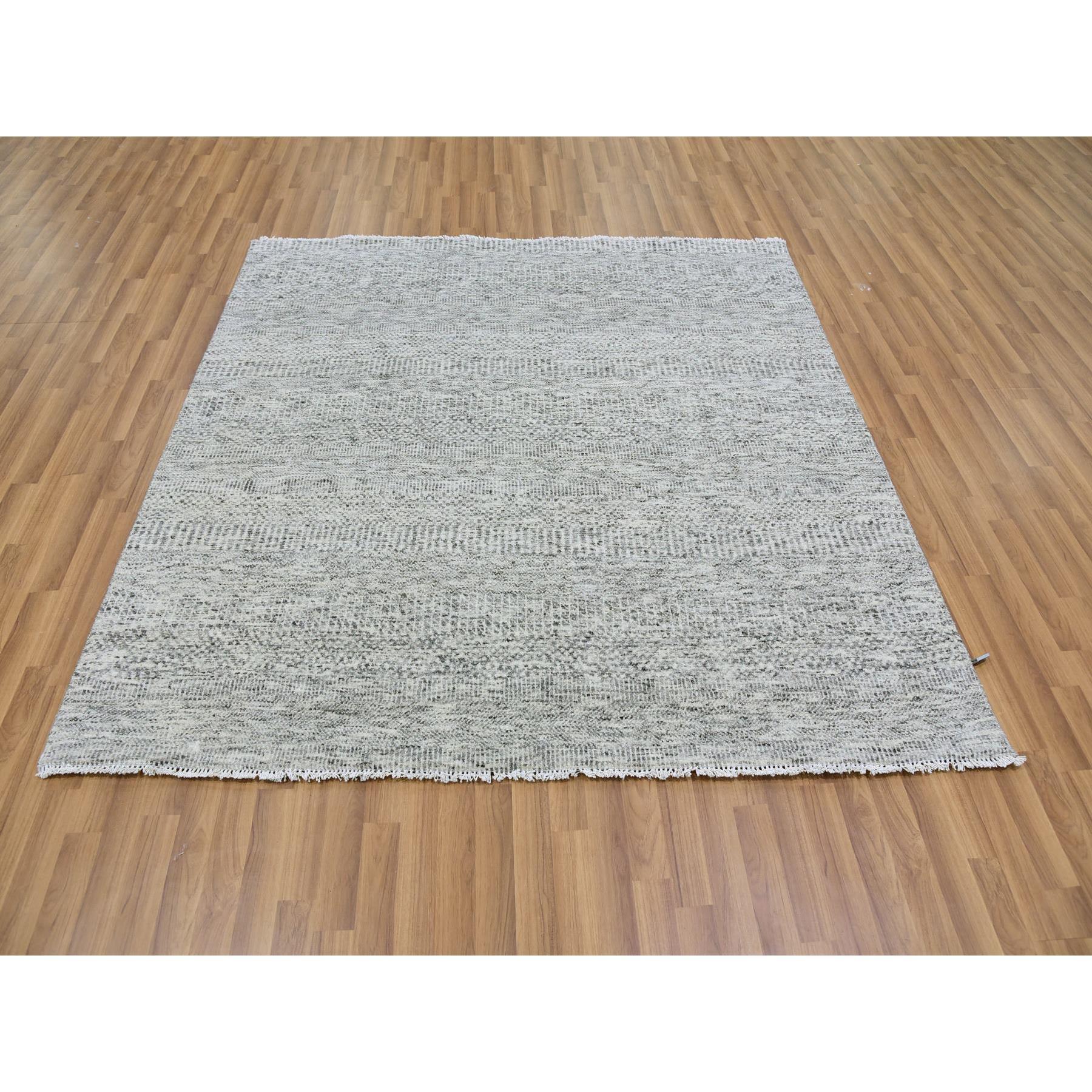 This is a truly genuine one-of-a-kind Undyed 100% Wool, Tone on Tone, Modern Grass Design, Hand Knotted, Oriental Rug. It has been Knotted for months and months in the centuries-old weaving craftsmanship techniques by artisans.
Primary materials: